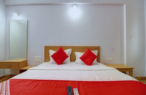 Surathkal Hotel | Capital O 13489 Garuda Comforts