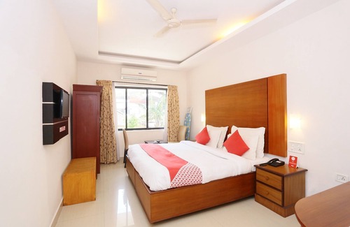 Kollam Hotel | Capital O 19742 Hotel Dona Castle