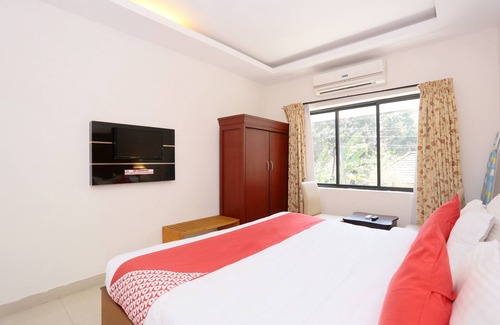 Kollam Hotel | Capital O 19742 Hotel Dona Castle
