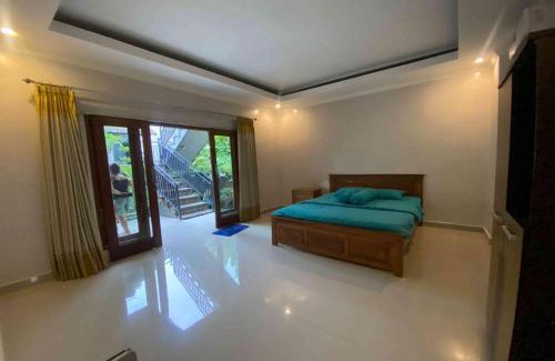 Melayang House | Capital O 93881 Jero House