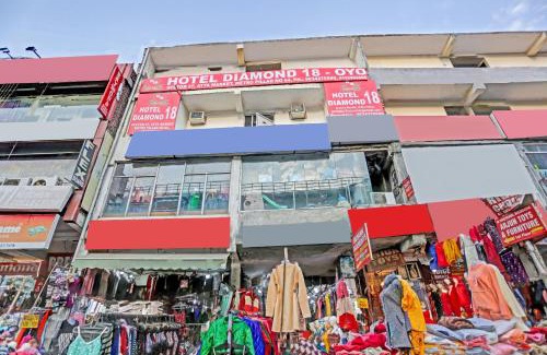 Sector 27 Hotel | Capital O Diamond 18 Near Worlds Of Wonder