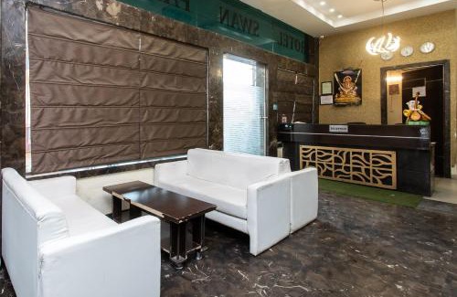Rau Hotel | Capital O Swan Paradise