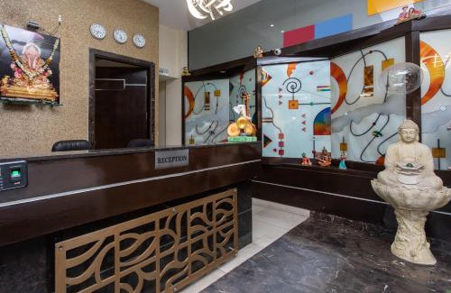 Rau Hotel | Capital O Swan Paradise