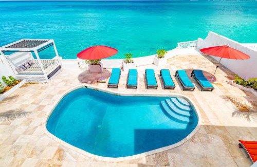Nassau House | Caprice 7 -Oceanfront Villa - Gated Community with Pool