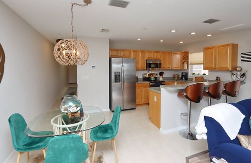 Indian Shores Condo | Captain's Cove waterfront condo with shared heated pool