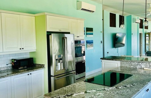 Estate Salt River Villa | Caribbean Camelot! Embrace your royal status as you relax in this castle-like retreat!