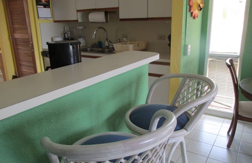 Estate Salt River Condo | Caribbean colors on wide open estate on a long sandy swimming beach.