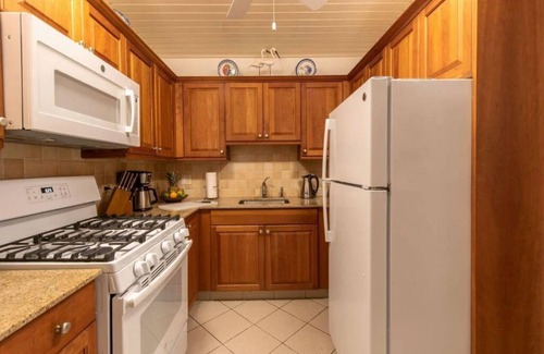 West End Village Hotel | Caribbean Getaway | Room w/Full Kitchen & Patio | Steps Away from the Beach