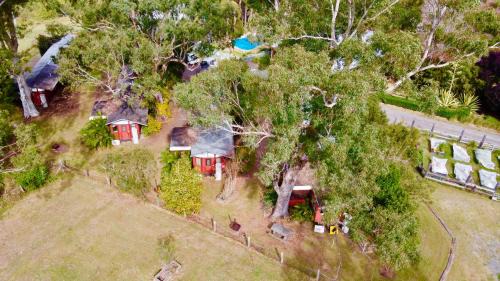Wirragulla House | Carriageway Retreat - Unique Red Rattler Carriages and Units