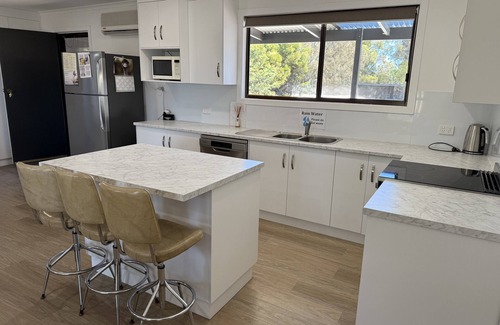 Carribie House | Carron Cottage - close to beach opposite general store. Off Peak Special!