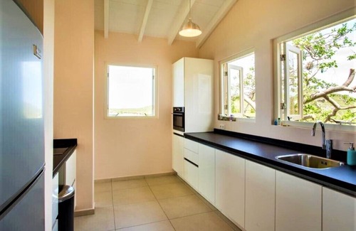 Bisento House | Cas Abou Waterfront Bungalow with Great Seaviews near Best Voted Beach