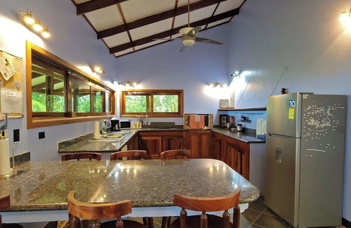 Pavones House | Casa Amarilla -Jungle Home with Ocean Views - as seen in 'Easy Living' magazine!
