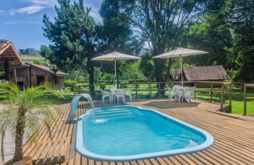Santo Antonio do Pinhal Hotel | Casa de Barro - Chalés