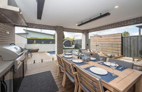 Safety Beach House | Casa de Praia - Luxe by the Bay with Heated Pool