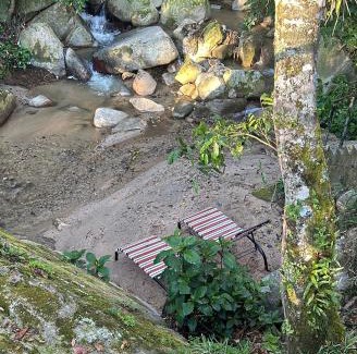 Jarabacoa House | Casa del Arroyo 2-Bedroom Cottage Fireplace and BBQ