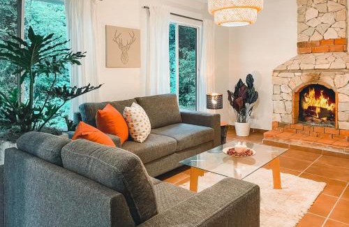 Jarabacoa House | Casa del Arroyo 2-Bedroom Cottage Fireplace and BBQ