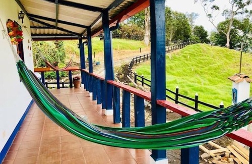 Pacho House | Casa ecoturistica con rio y vista a las montañas