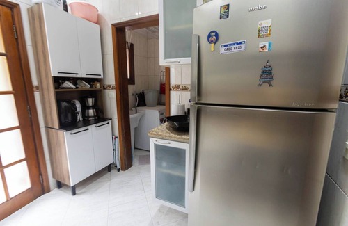 Balneario Guaruja Ski Chalet | Casa em condomínio com piscina, Wi-Fi e garagem