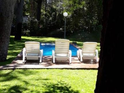 Monte Hermoso House | Casa en barrio Las Dunas con pileta climatizada y parrilla