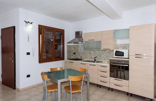 Porto Torres Apartment | Casa Maestrale - Holiday Home in residential area