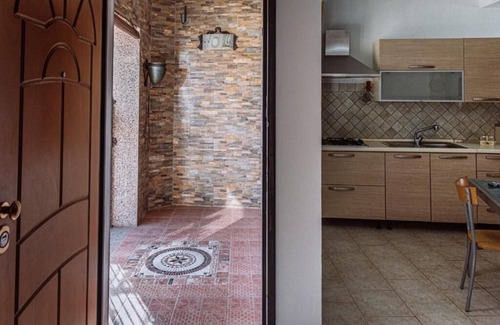 Porto Torres Apartment | Casa Maestrale - Holiday Home in residential area