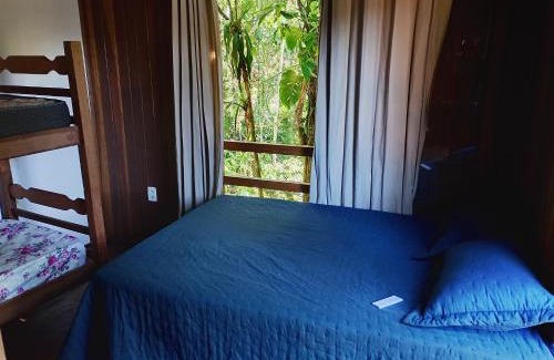 Taquaral House | Casa na beira da cachoeira