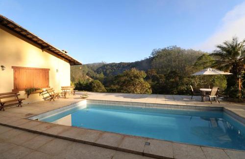 Osasco House | Casa nas montanhas com piscina, lazer completo e vista encantadora