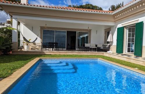 Sao Martinho Villa | Casa Roc Madeira - 5 Bedrooms - Ocean and City Views - Private Heated Pool