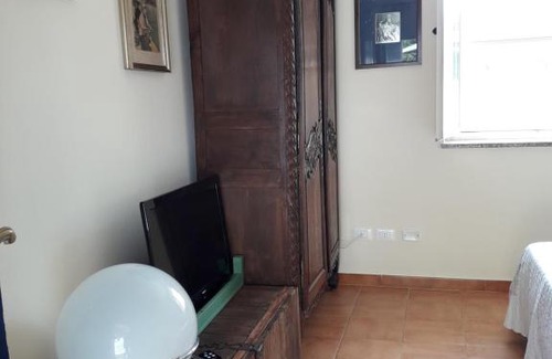 Terracina House | Casa rosa