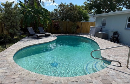 Merritt Island House | Casa Tipica! 4-bedroom tropical oasis in Merritt Island with heated pool