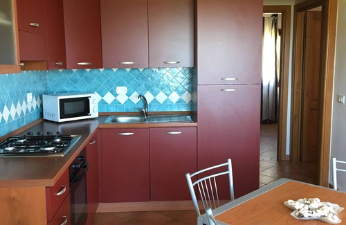 Budoni House | Casa Vacanze con uso Piscina Condominiale
