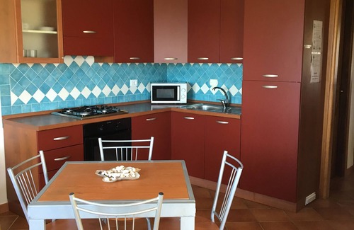 Budoni House | Casa Vacanze con uso Piscina Condominiale