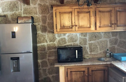 Olmeto House | Caseddu in the shade of the Olive Trees, just a few steps from the sea.