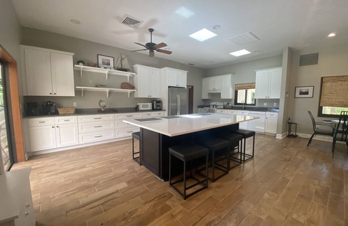 Nokomis House | Casey Key Oasis 3BR home on .75 acre w heated pool, boat dock, beach access