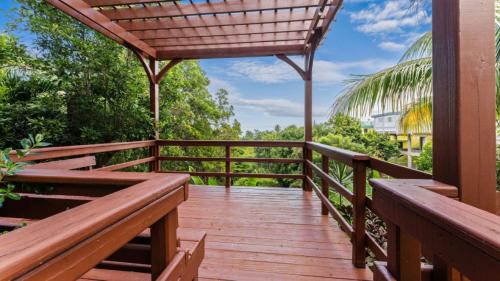 Puntas Apartment | Casita 3 at Ceiba Tree Inn. Tranquility with Garden Views and Pergola with Ocean Overlook