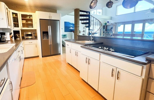 North Side House | Castaway Cove: Tropical Beachfront Villa with Superb Snorkeling and Coastal Views
