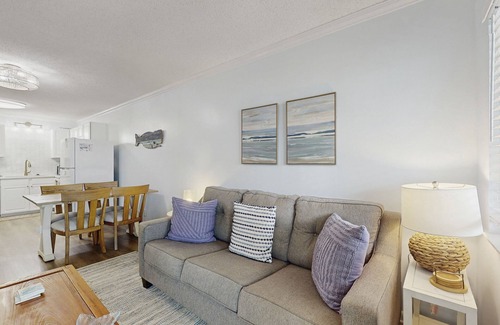 Fort Morgan Condo | Casual condo steps from the beach with AC, balcony, resort pools, & free WiFi