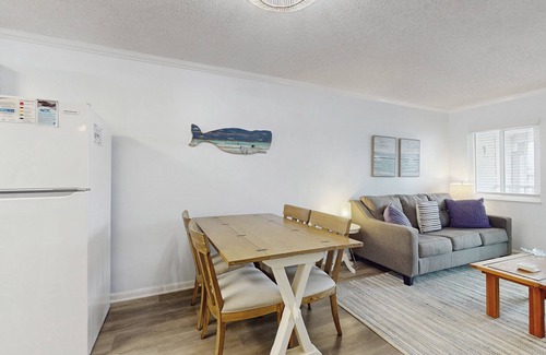 Fort Morgan Condo | Casual condo steps from the beach with AC, balcony, resort pools, & free WiFi