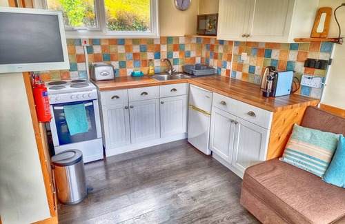 Mumbles Ski Chalet | Caswell Beach Chalet located in Gower Peninsula