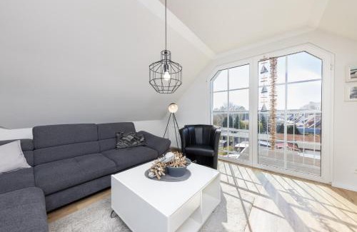 Hohe Dune Apartment | CBlue "Ferienhaus am Yachthafen - Yacht"