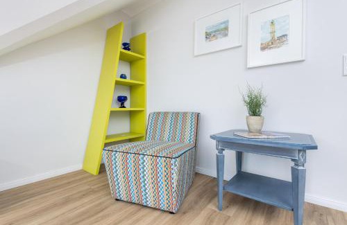 Hohe Dune Apartment | CBlue "Ferienhaus am Yachthafen - Yacht"