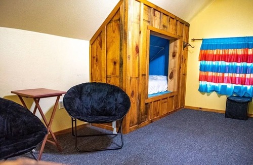 Lindale Cabin | Cedar Loft-This rustic retreat is just a short drive from fishing and shopping