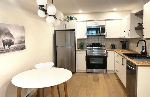Victoria Apartment | Cedar & Sage - Kitchen & Trails near Royal Roads