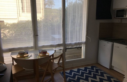 Merville-Franceville-Plage Apartment | Central Apartment with Terrace, Close to Beach, Pets Allowed