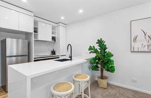 City East Apartment | Central 2-Bed with Gym, BBQ & Stunning Views