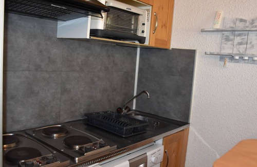 Pralognan-la-Vanoise Apartment | Central Apartment with Balcony, Parking, and Close to Shops and Lift
