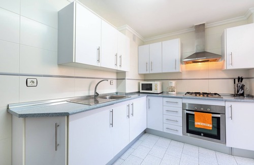 Plaza de Toros Vieja Apartment | Central City Apartment Canales with Wi-Fi, Air Conditioning & Balcony; Garage Available