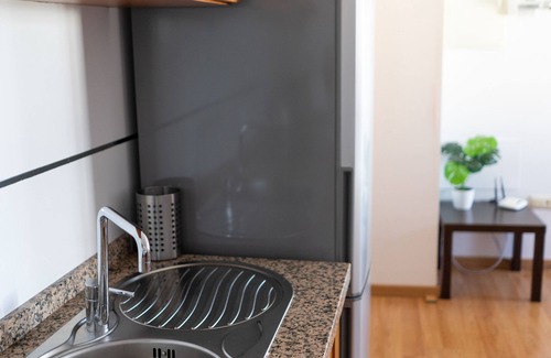 Distrito Centro Apartment | Central penthouse with terrace, parking, A /C, wifi, next to the town hall.