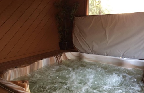 Killington Ski Chalet | Central Ski home with Hot Tub, sauna, walk to restaurants, and ski shops