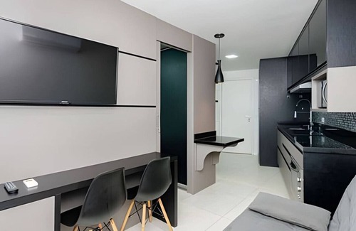 Reboucas Apartment | Central Studio in the 7Th Avenue Building, with air and parking space